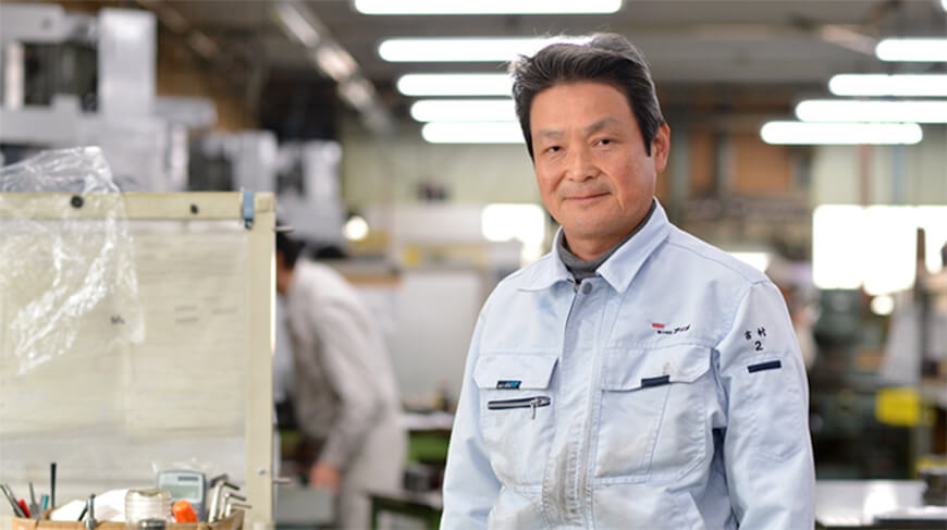 取締役専務 吉村今朝夫